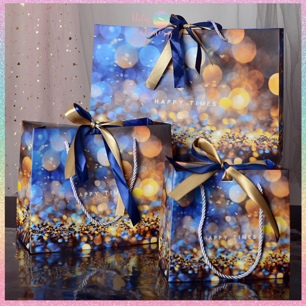 - Túi giấy đựng quà tặng nhiều hình xinh xắn có quai xách