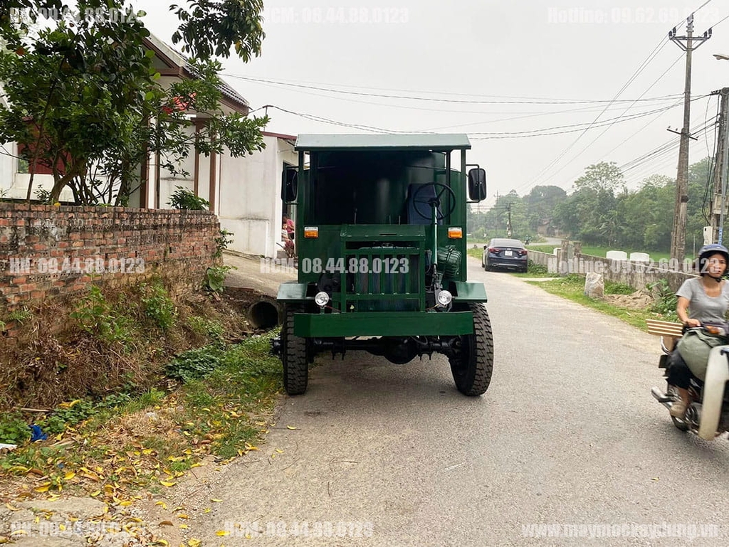 Máy trộn bê tông tự hành 4 khối 2 cầu phanh hơi lốc kê