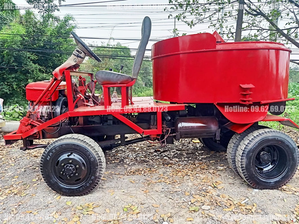 Máy trộn bê tông tự hành 12 bao 2 cầu Phanh hơi lốc kê