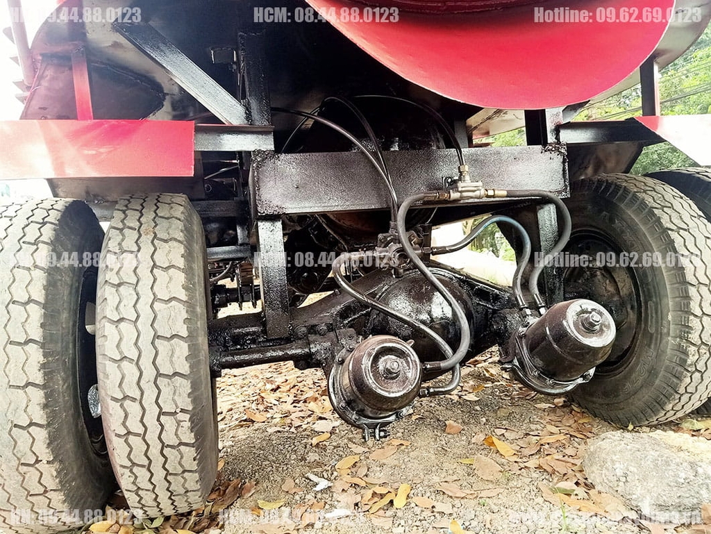 Máy trộn bê tông tự hành 12 bao 2 cầu Phanh hơi lốc kê