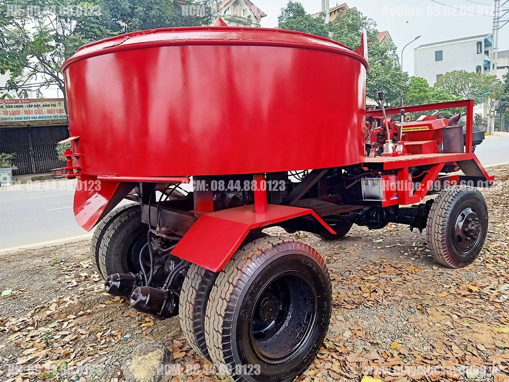 Máy trộn bê tông tự hành 12 bao 2 cầu Phanh hơi lốc kê