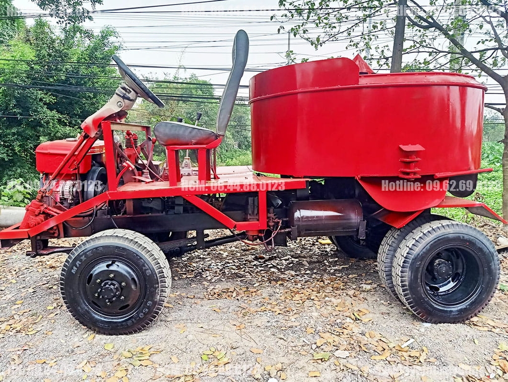 Máy trộn bê tông tự hành 12 bao 2 cầu Phanh hơi lốc kê