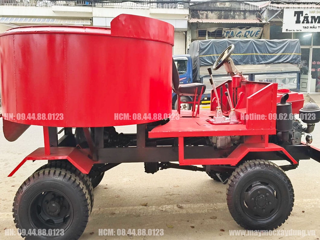Máy trộn bê tông tự hành 12 bao 2 cầu