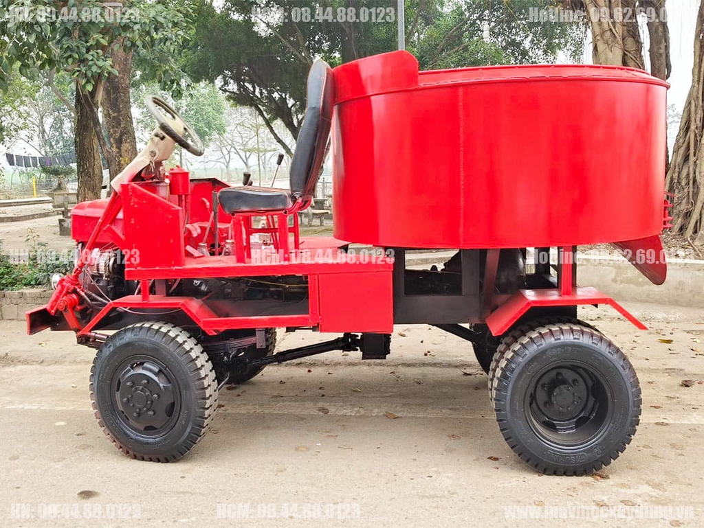 Máy trộn bê tông tự hành 12 bao 2 cầu
