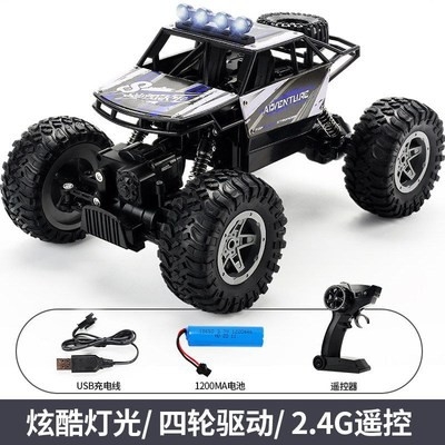 Mô hình xe đua địa hình 4WD điều khiển từ xa động cơ kép vỏ kim loại bánh xích đá tần số 2.4GHz tỉ lệ 1:16 dà