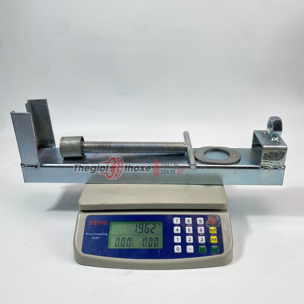 Vam tháo lò xo giảm xóc xe máy