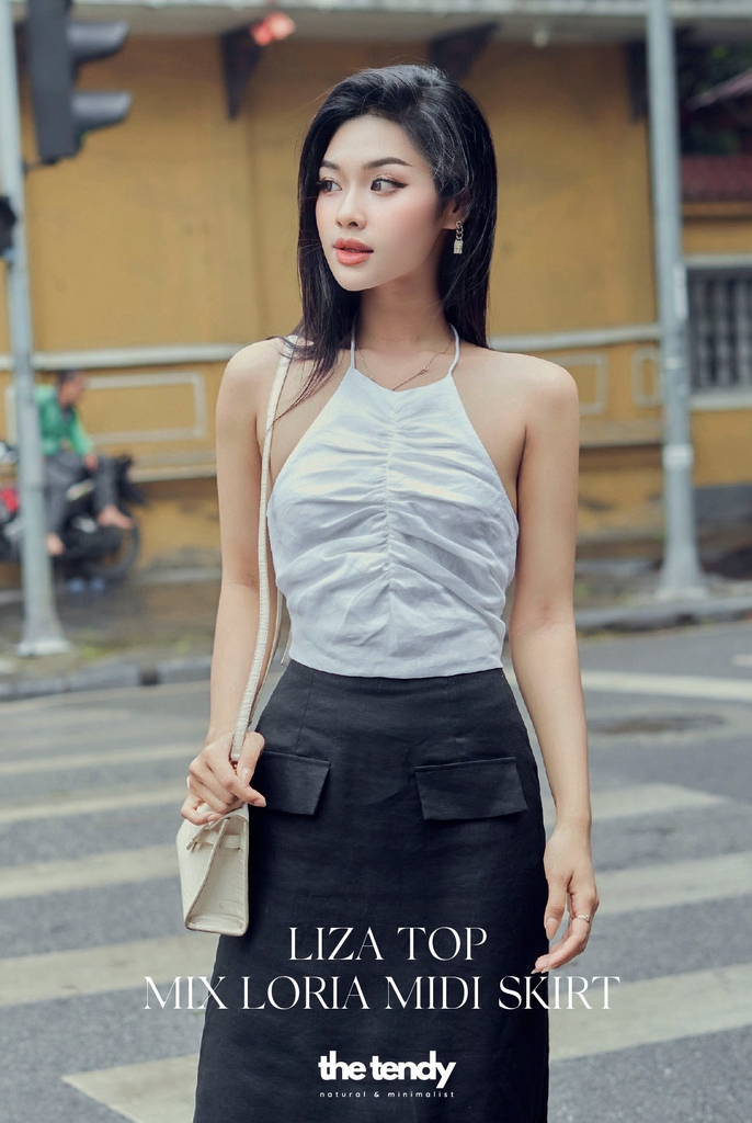 Chân váy Loria dáng dài có túi giả phía trước