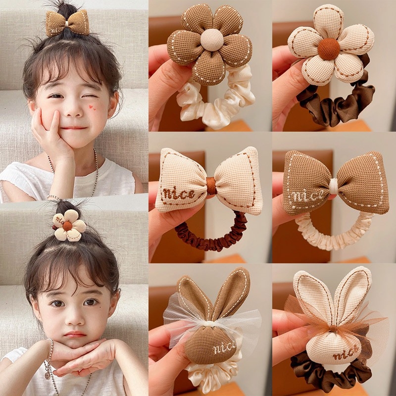 Cột tóc đính nơ hoa + tai thỏ (màu trà sữa) - kiểu 3