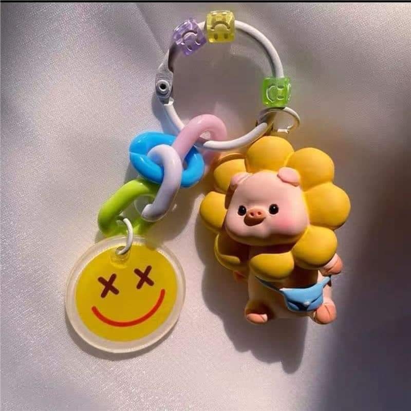 Móc khóa hình heo bông hoa