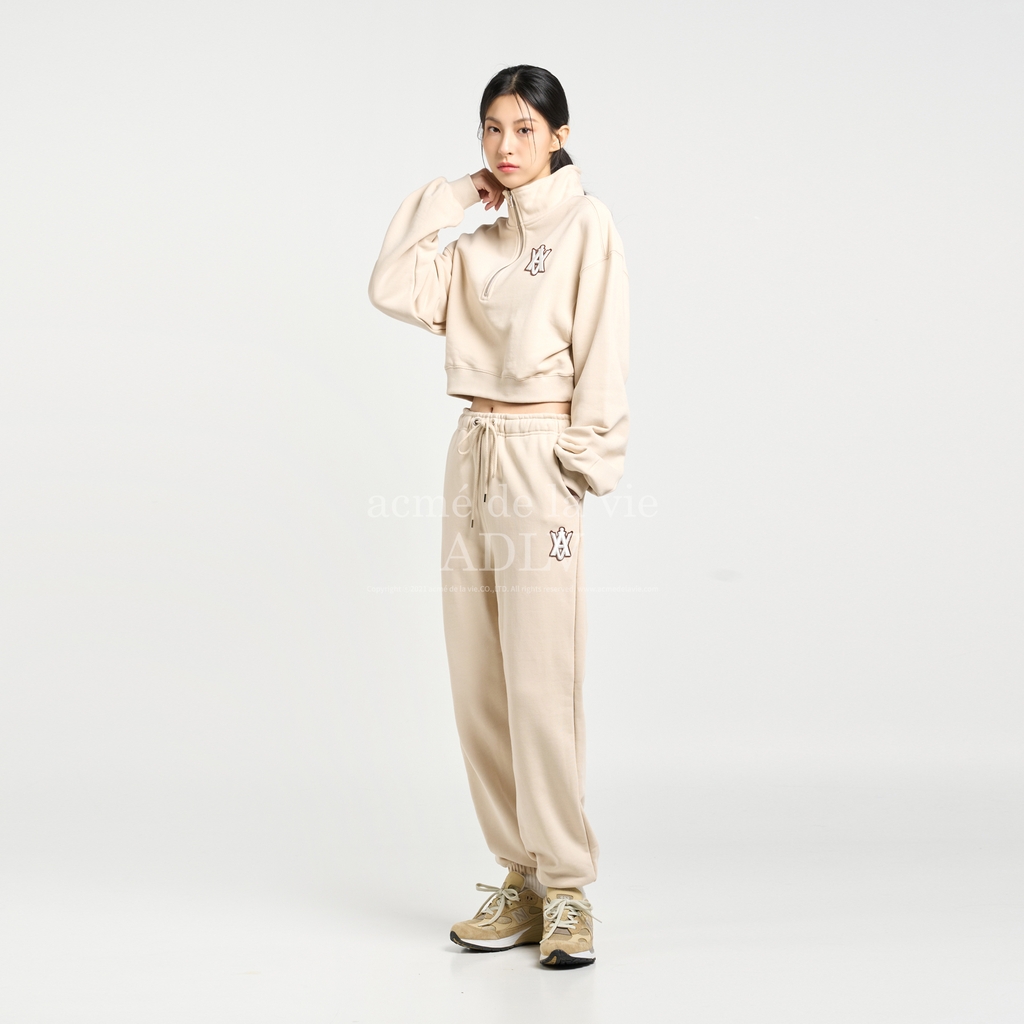 Bộ Nỉ ADLV Croptop Logo Lisa Màu Be