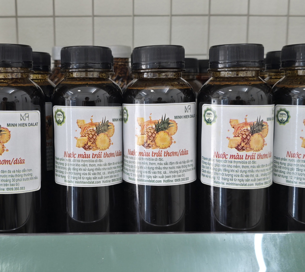 Nước màu  cô đặc từ nước cốt trái thơm/dứa ( dùng ướp món kho) chai 330ml