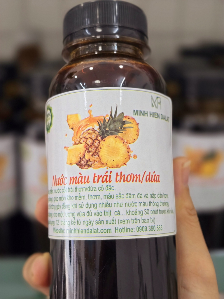 Nước màu  cô đặc từ nước cốt trái thơm/dứa ( dùng ướp món kho) chai 330ml