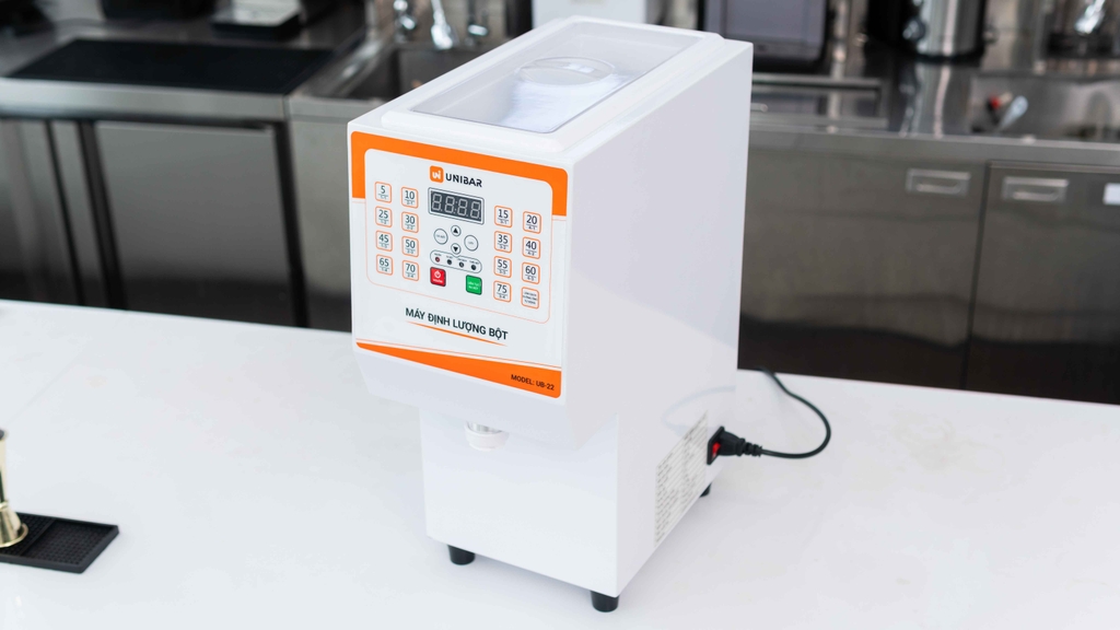 Máy định lượng bột Unibar UB-22