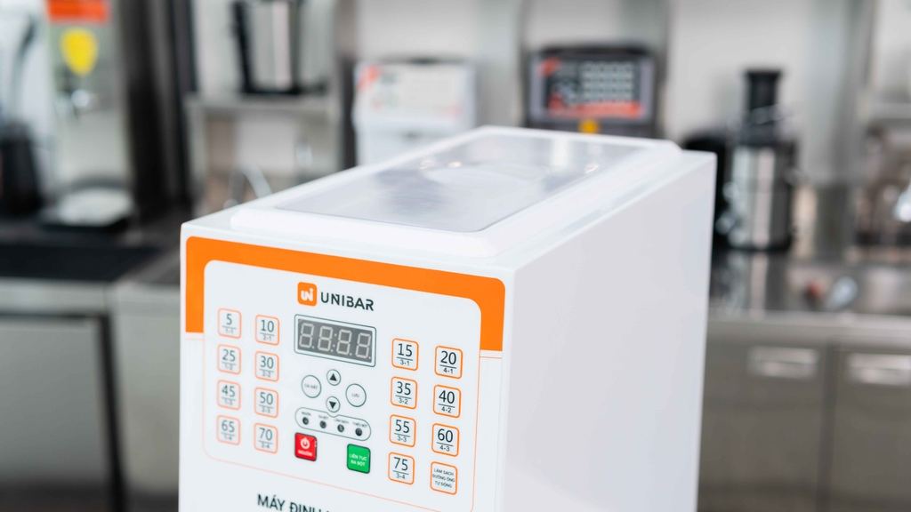 Máy định lượng bột Unibar UB-22