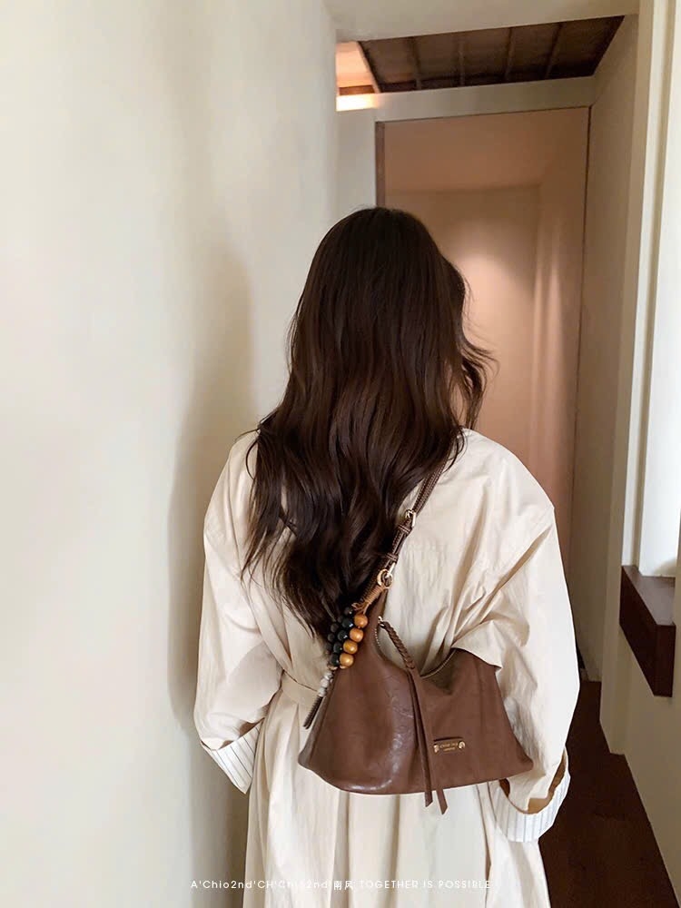 TÚI CHIO TONE TRẮNG NÂU NỮ