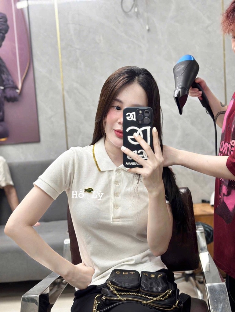 ÁO POLO CÁ SẤU TRẮNG VIỀN CAM NỮ SẴN