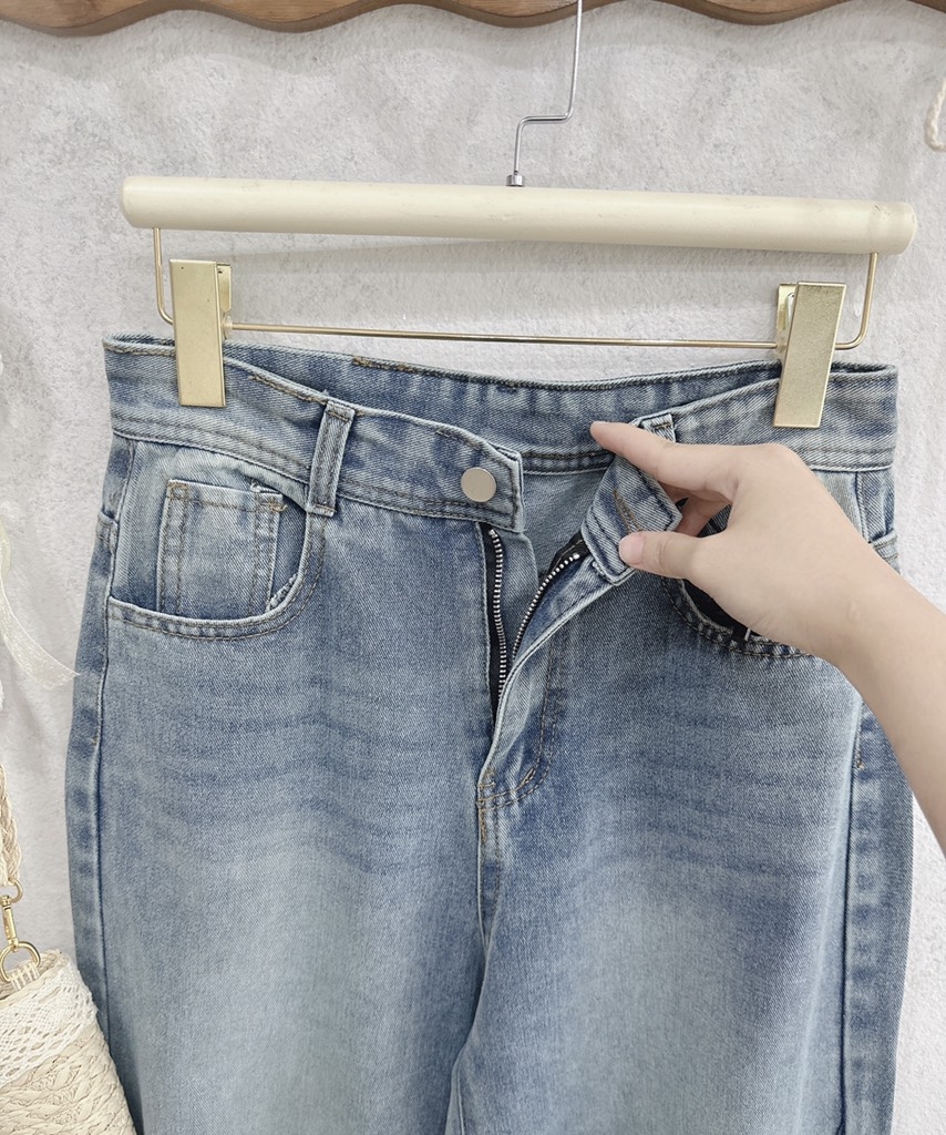 QUẦN JEANS NỮ LOE GẤU VẠT KIỂU