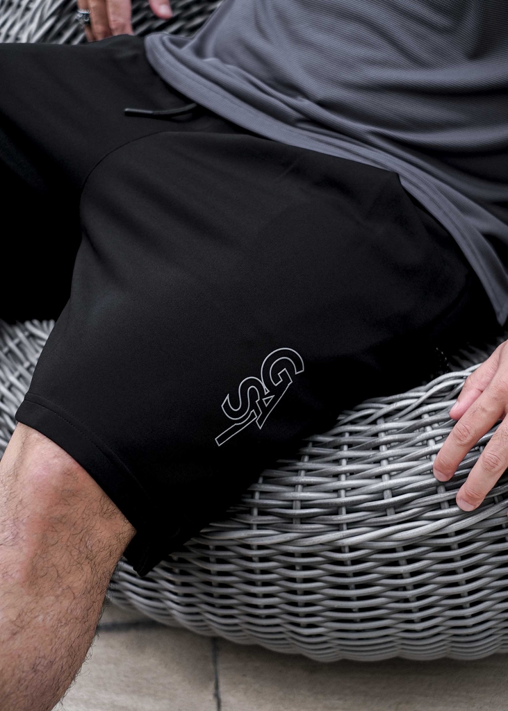 Quần Thun ngắn Big size Xẻ tà Túi zip