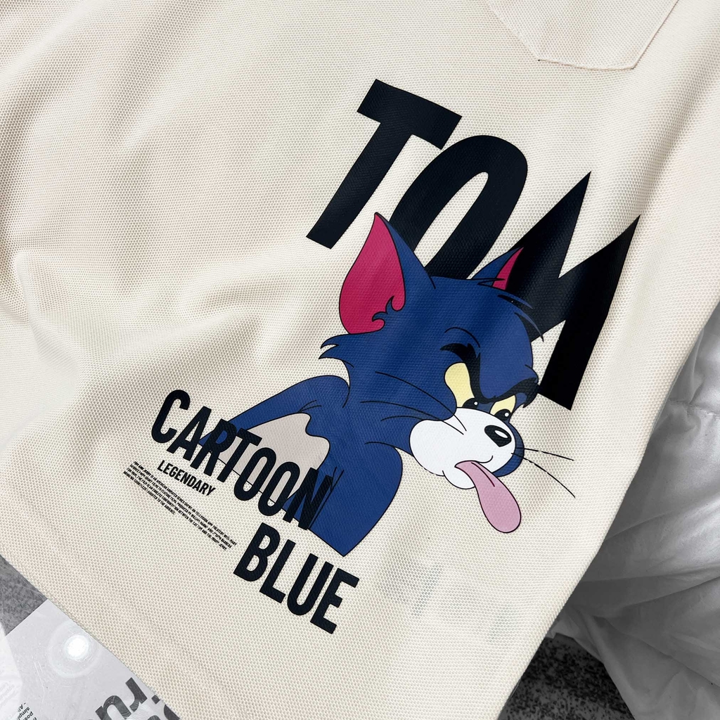 Áo Thun Big size Có Túi In Tom & Jerry Màu Kem
