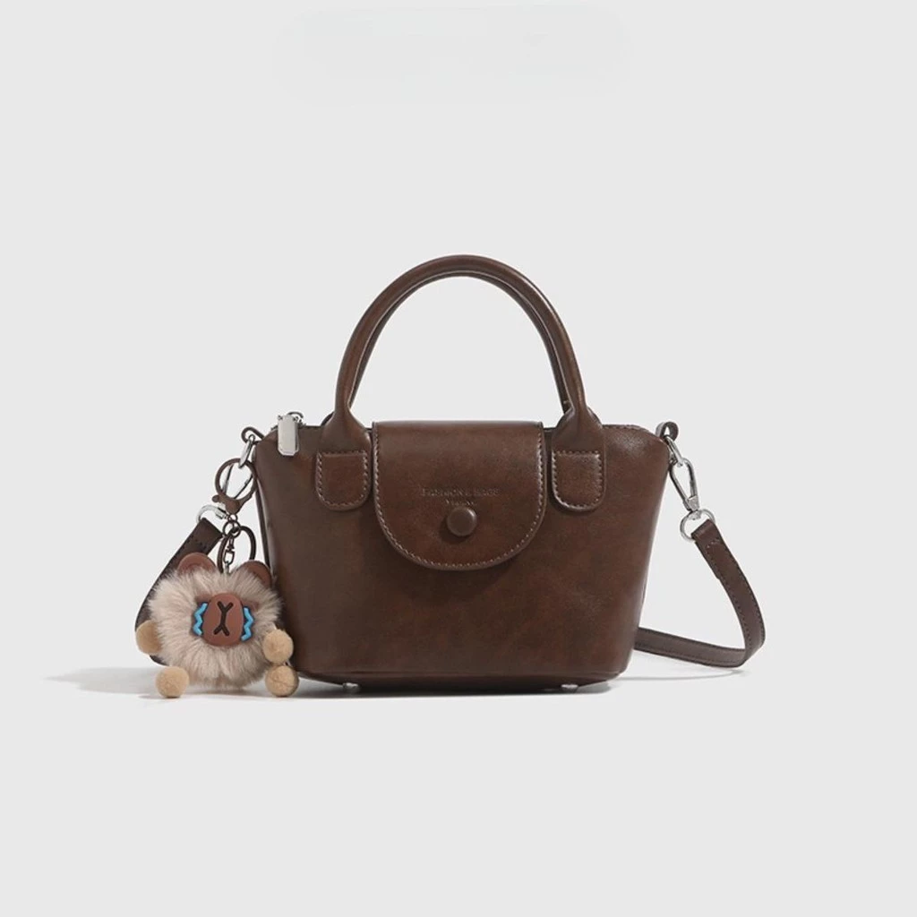 Túi đeo chéo có tay cầm size 18cm HA749