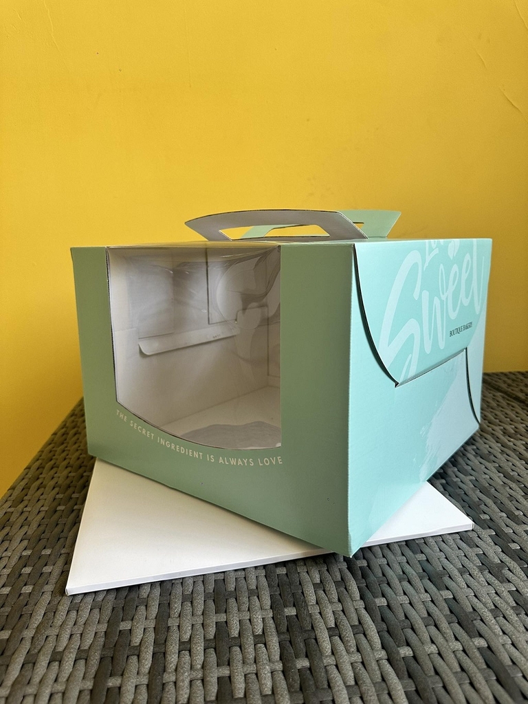 Hộp bánh kem quai xách cửa sổ xanh