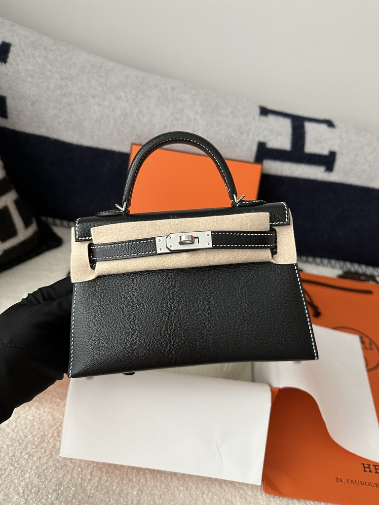 Kelly Mini II, Imported Chevre Goat Leather, CK89 Noir Black & Q5 Rouge Casaque Red with Silver Hardware.
