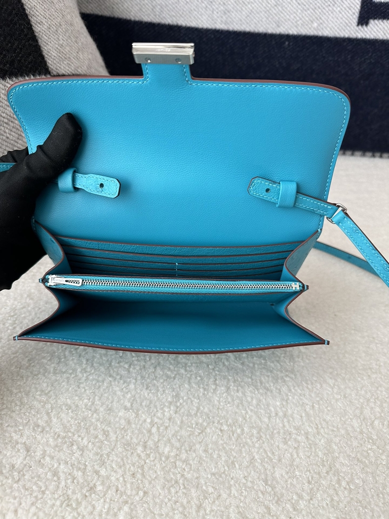 Constance To Go Crossbody Wallet, Imported Klein Karoo Ostrich Skin, CK79 Aqua with Silver Hardware.