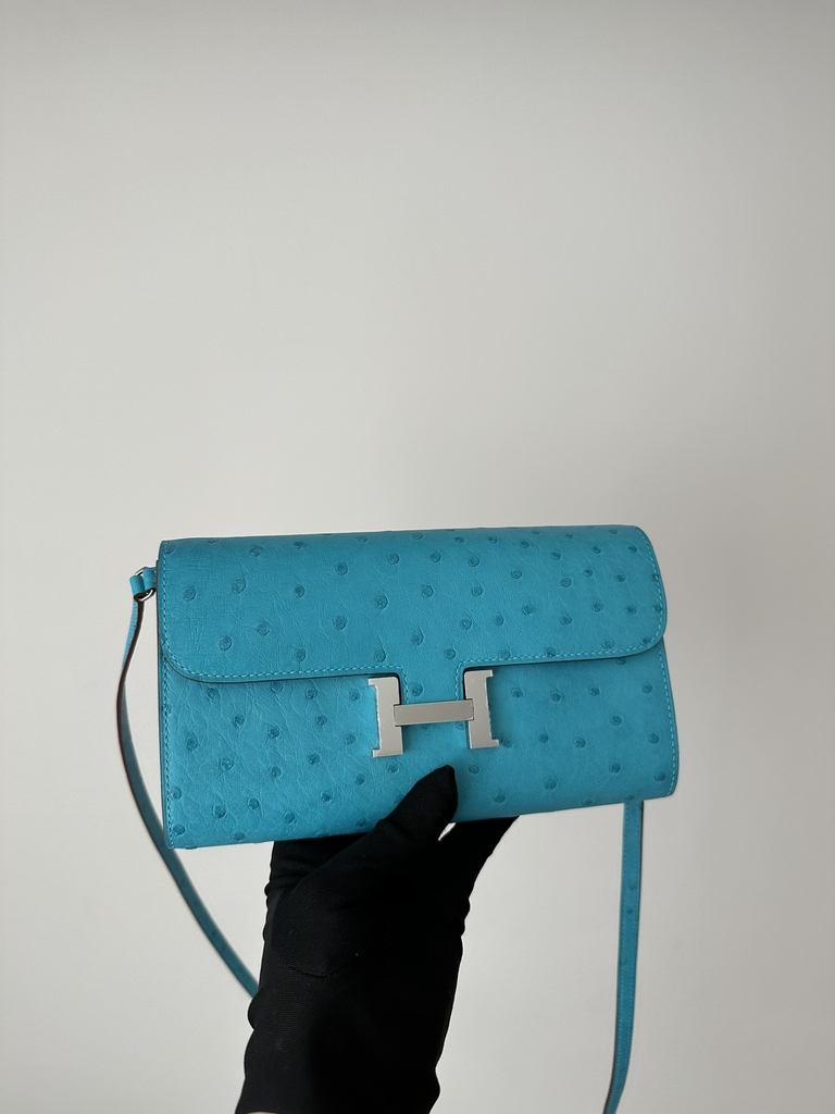 Constance To Go Crossbody Wallet, Imported Klein Karoo Ostrich Skin, CK79 Aqua with Silver Hardware.