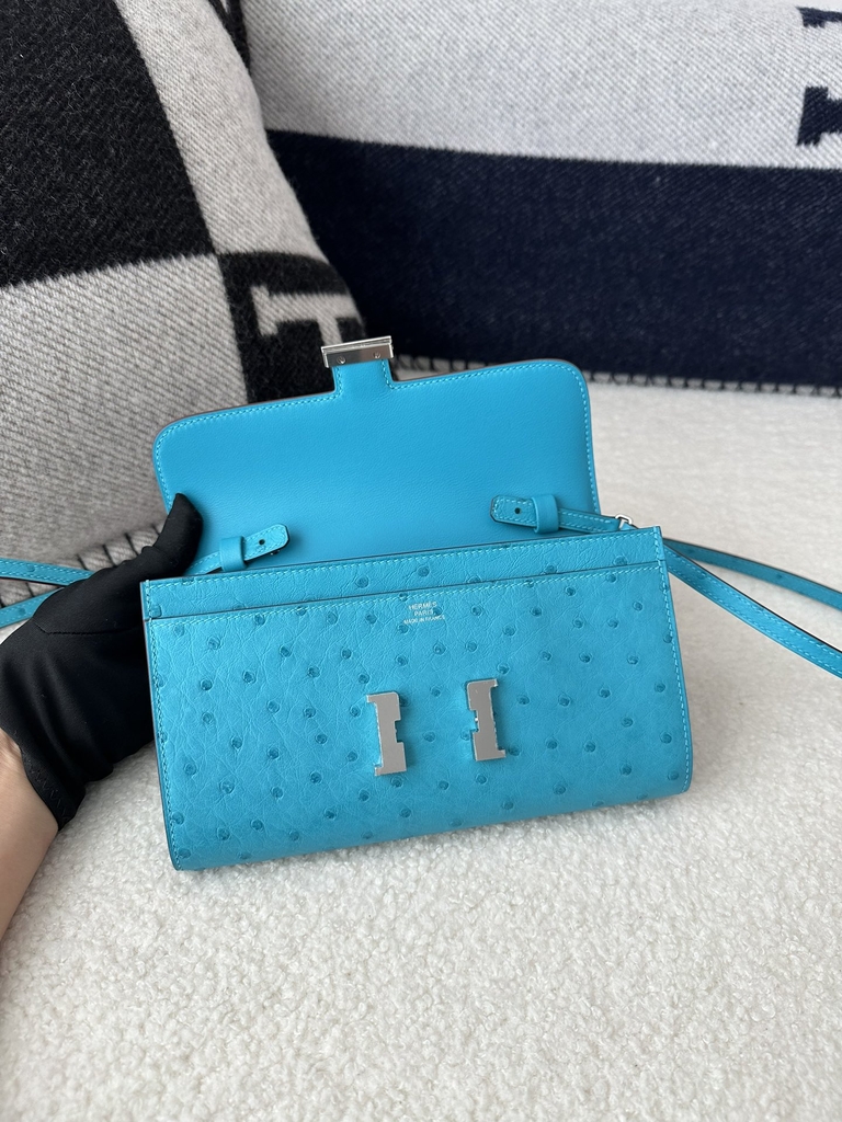 Constance To Go Crossbody Wallet, Imported Klein Karoo Ostrich Skin, CK79 Aqua with Silver Hardware.