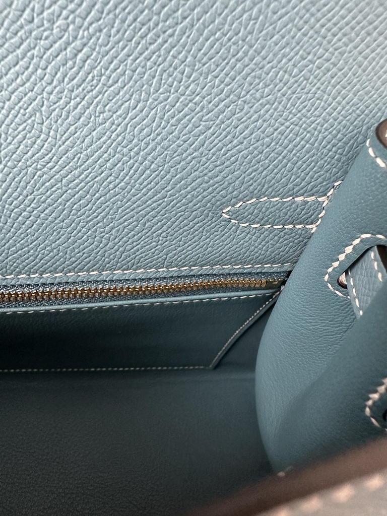 Kelly 25cm in imported Epsom grained leather, CC75 Blue Jean (denim blue) with gold hardware.
