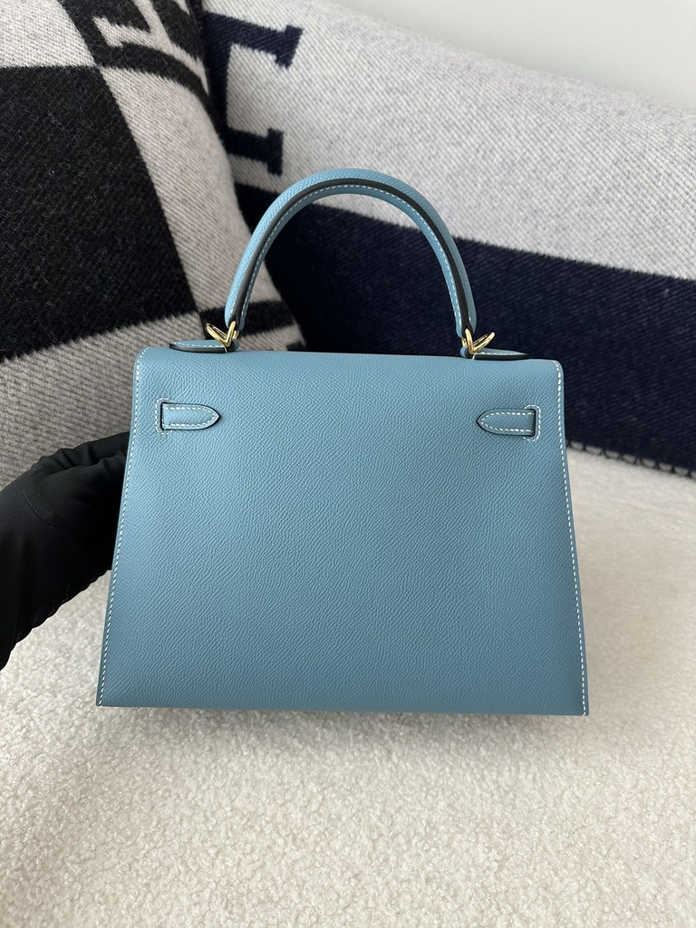 Kelly 25cm in imported Epsom grained leather, CC75 Blue Jean (denim blue) with gold hardware.