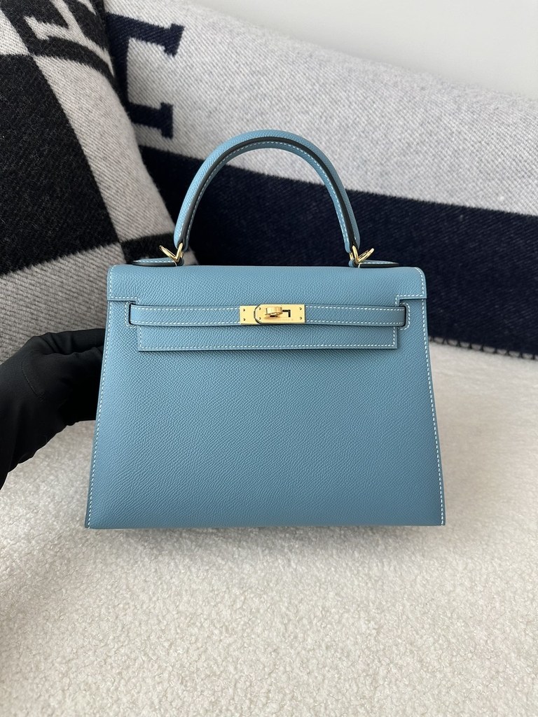 Kelly 25cm in imported Epsom grained leather, CC75 Blue Jean (denim blue) with gold hardware.