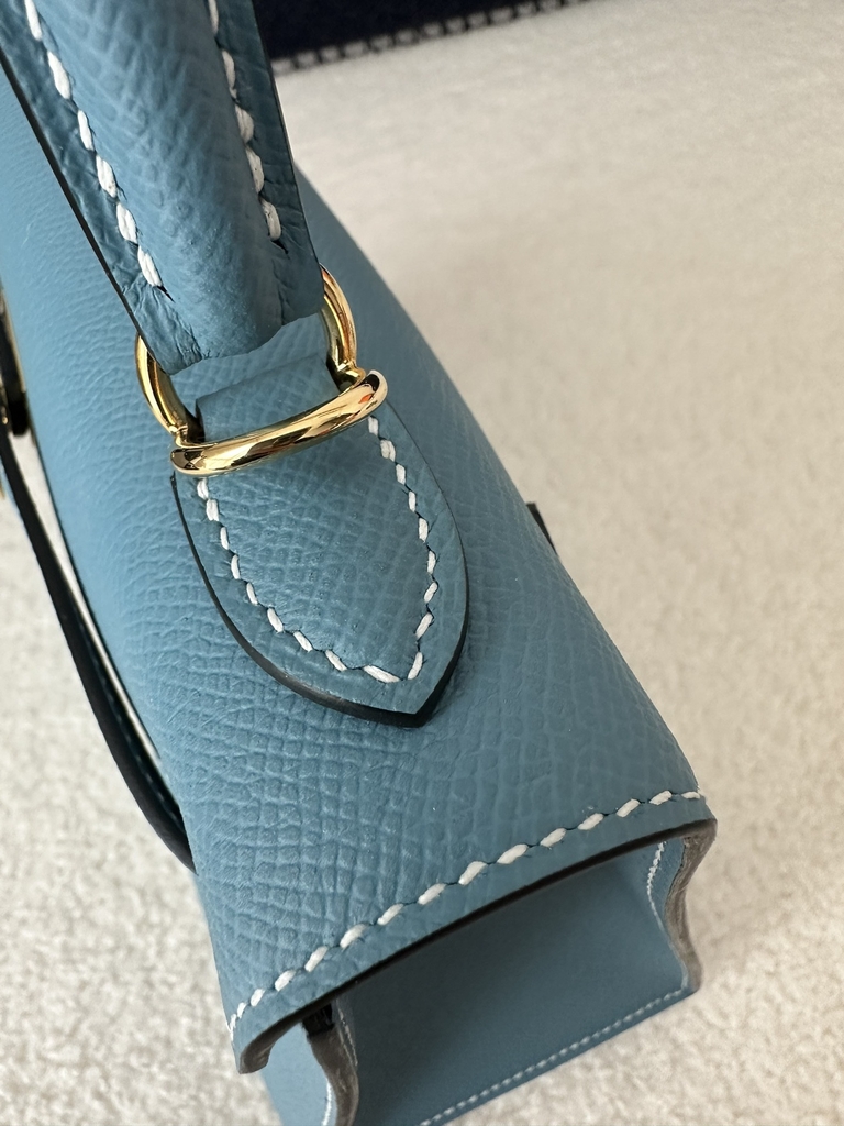 Kelly 25cm in imported Epsom grained leather, CC75 Blue Jean (denim blue) with gold hardware.