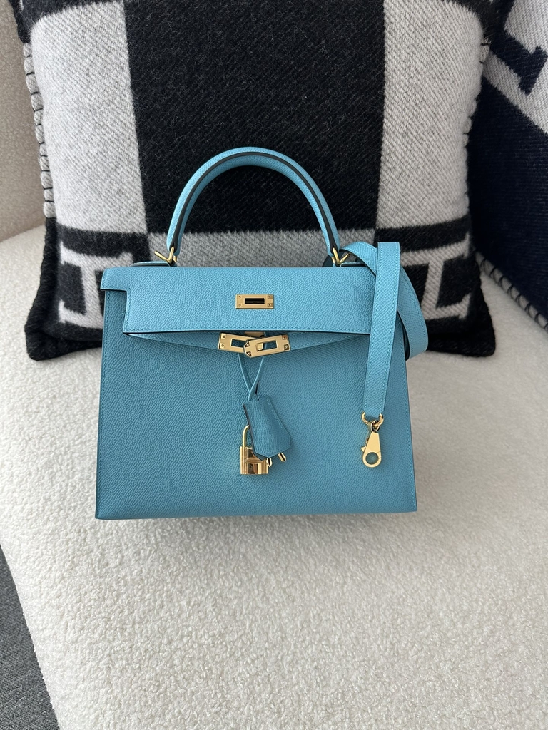 Kelly 25cm in imported Epsom grained leather, P3 Blue du Nord (northern blue) with gold hardware.