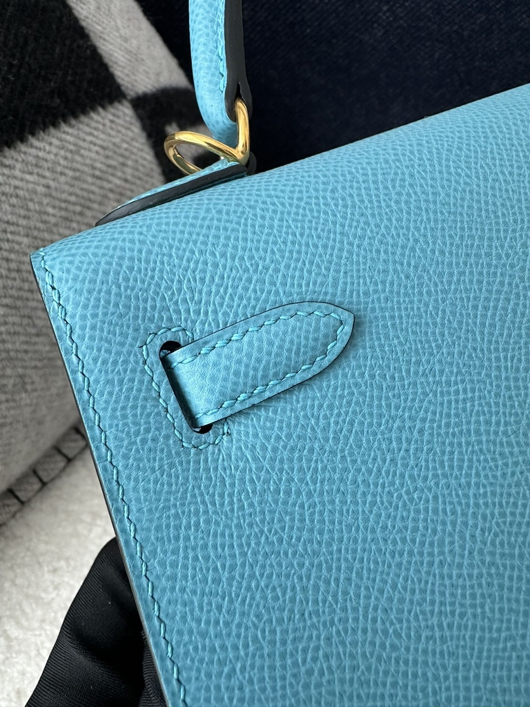 Kelly 25cm in imported Epsom grained leather, P3 Blue du Nord (northern blue) with gold hardware.