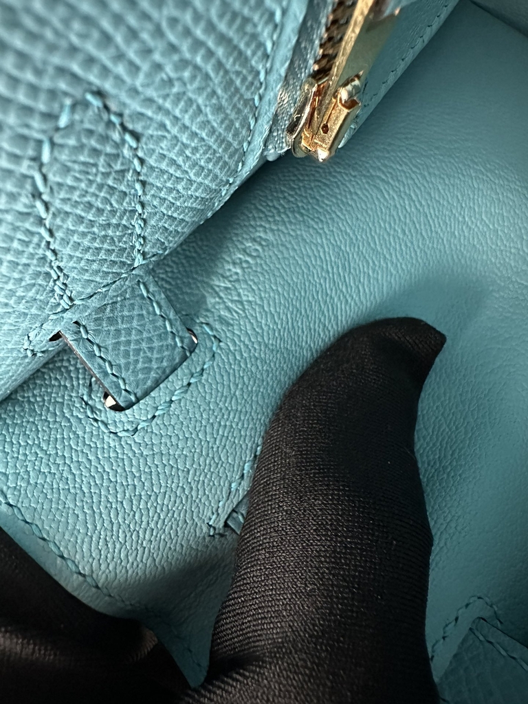 Kelly 25cm in imported Epsom grained leather, P3 Blue du Nord (northern blue) with gold hardware.