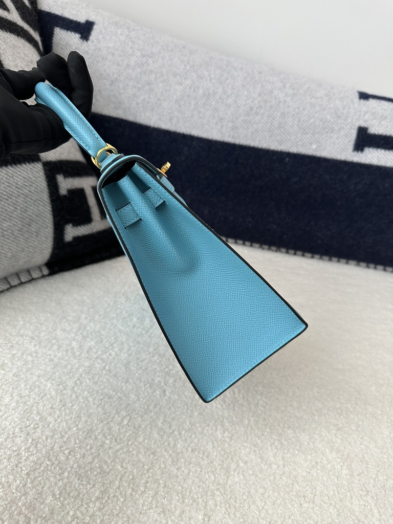 Kelly 25cm in imported Epsom grained leather, P3 Blue du Nord (northern blue) with gold hardware.