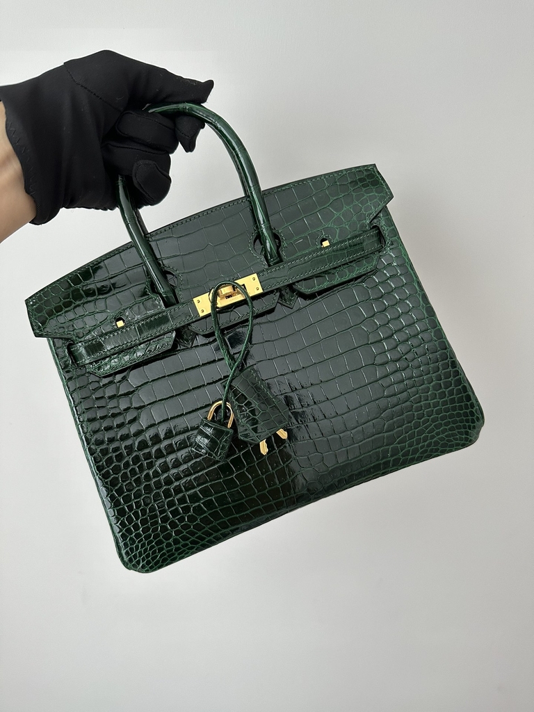 Birkin 25cm in Shiny Porosus Crocodile, imported HCP water-dyed glossy crocodile skin, CC67 Vert Fonce Emerald Green with Gold Hardware.