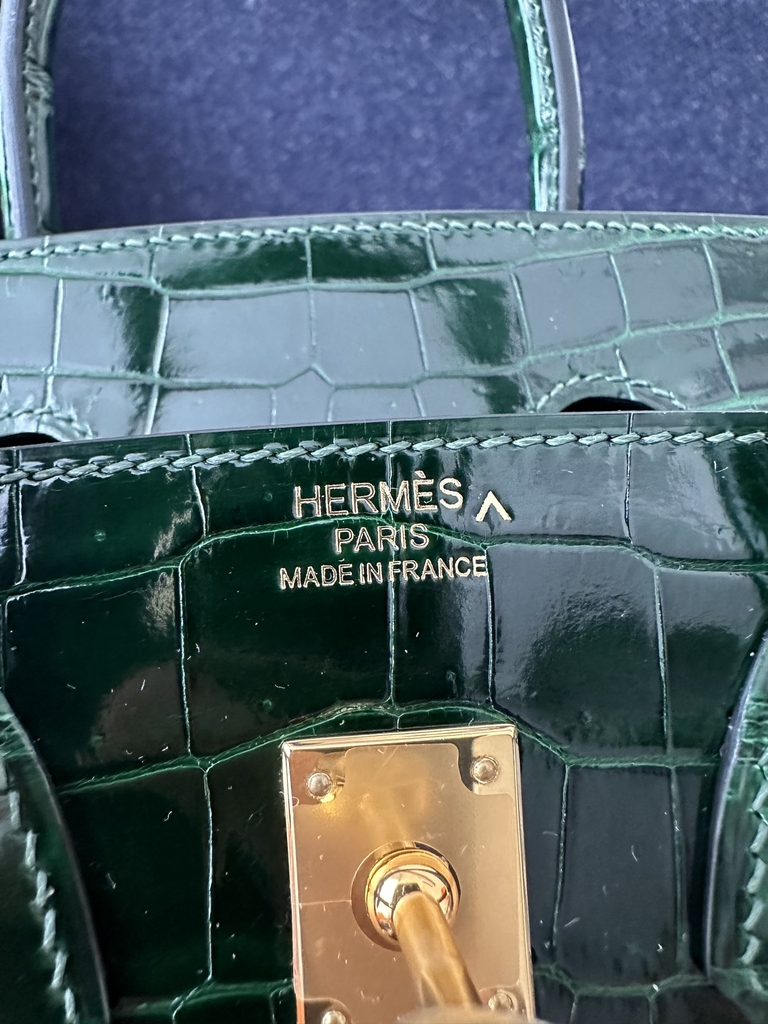 Birkin 25cm in Shiny Porosus Crocodile, imported HCP water-dyed glossy crocodile skin, CC67 Vert Fonce Emerald Green with Gold Hardware.