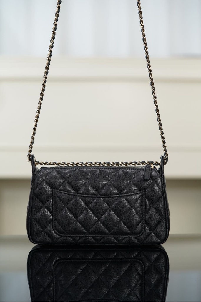 Chanel 25A Hidden Style Mahjong Bag in Black and Gold
