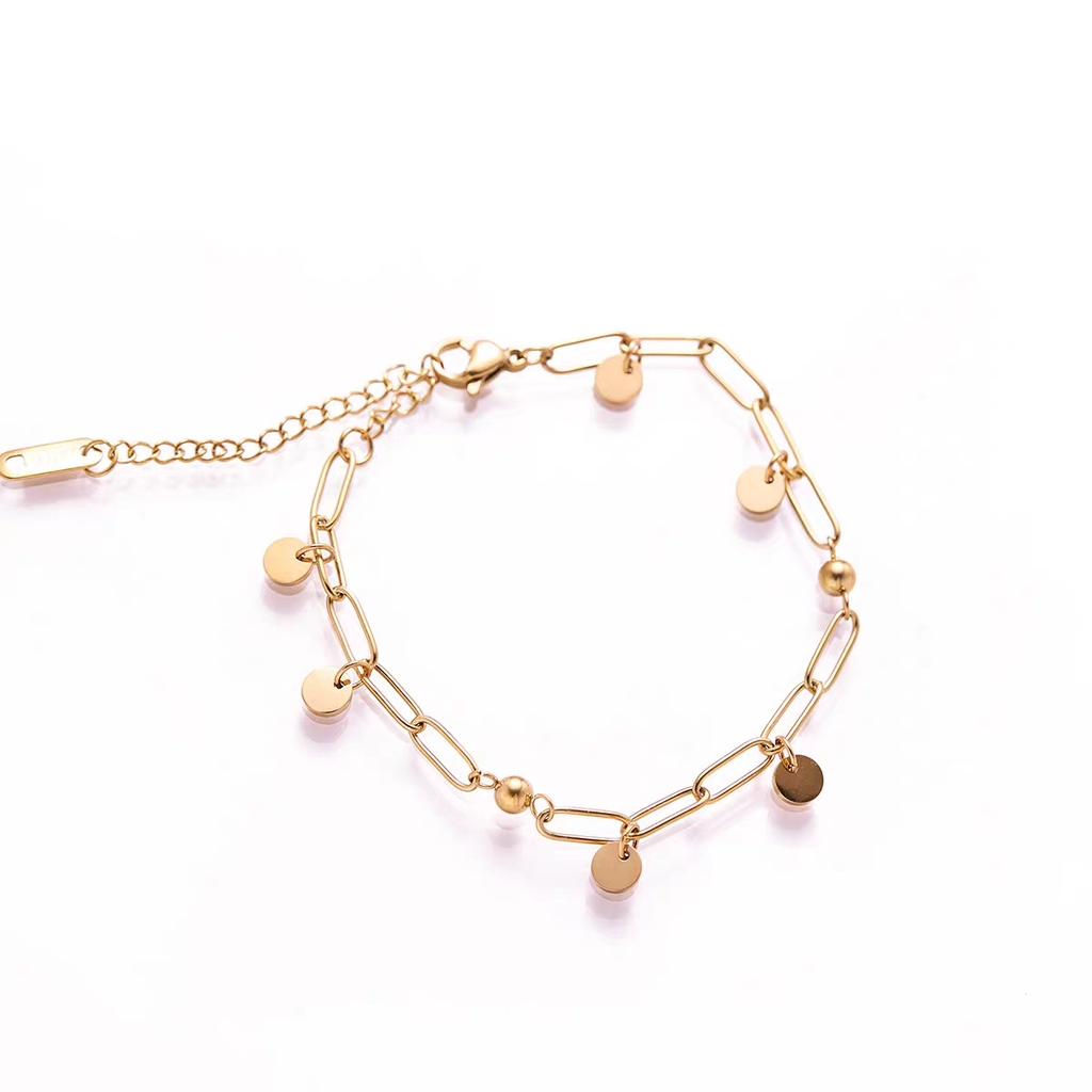 Vòng tay titan mạ vàng charm tròn 2501001