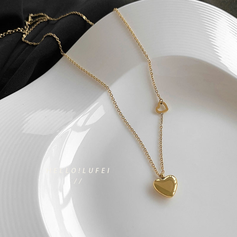 Dây chuyền titan tim  vàng 2500450