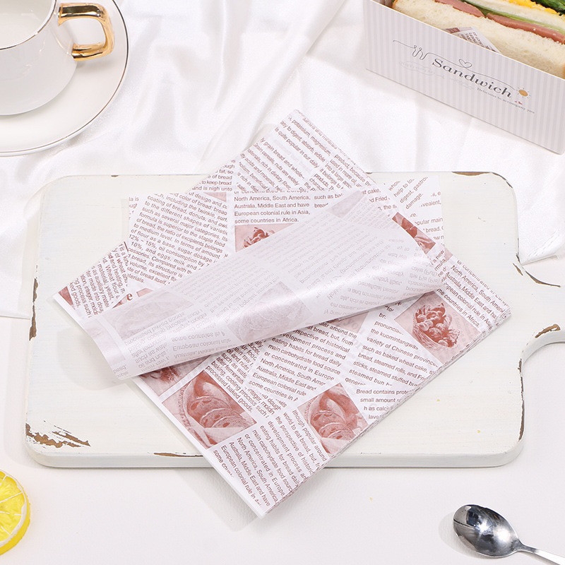 Giấy lót thấm dầu hình báo vuông 18 x 18cm lót hộp bento hộp bánh các loại