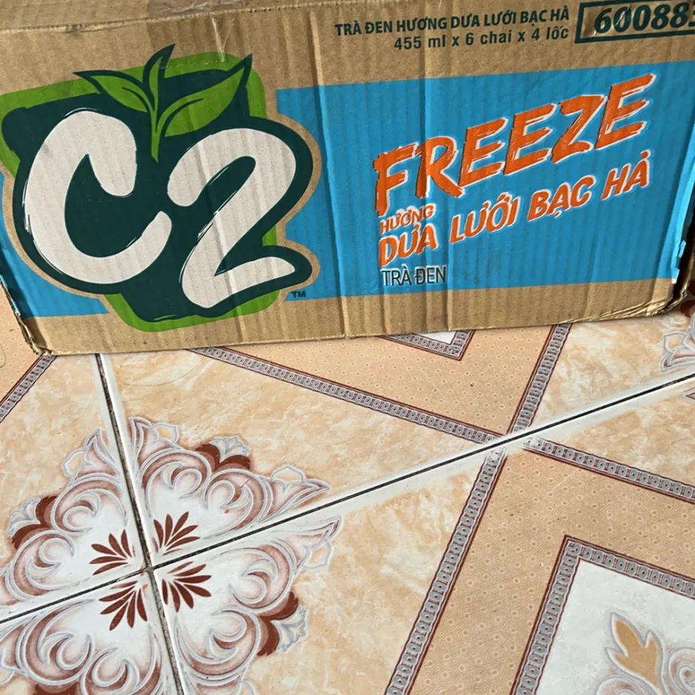 Thùng 24 chai trà đen C2 Freeze hương dưa lưới bạc hà 455ml