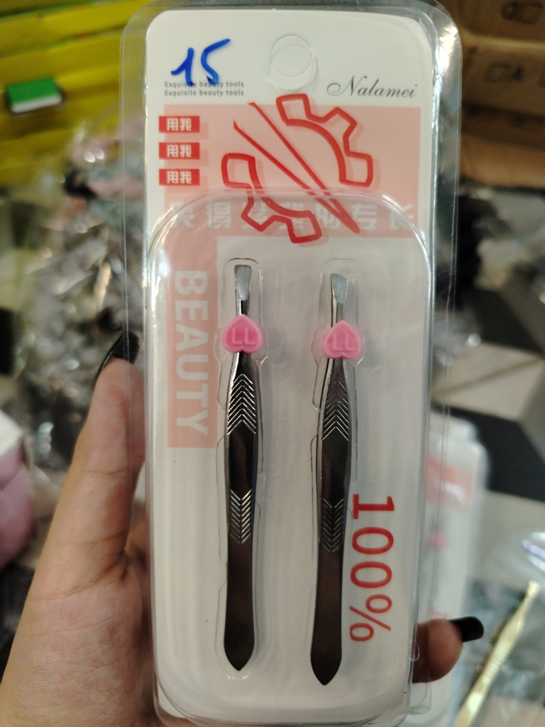 Nhíp