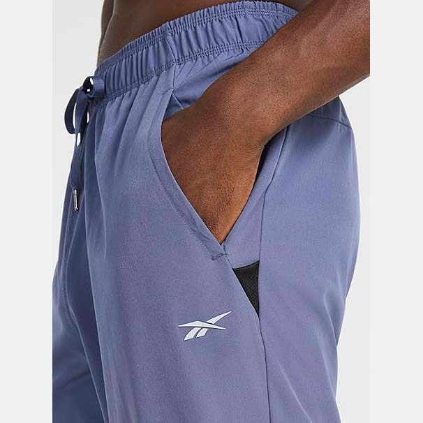 Quần dài Reebok  Chính Hãng -  Travel Jogger Standard Fit 30” Inseam - Màu xanh | Japansport REM233PA25010