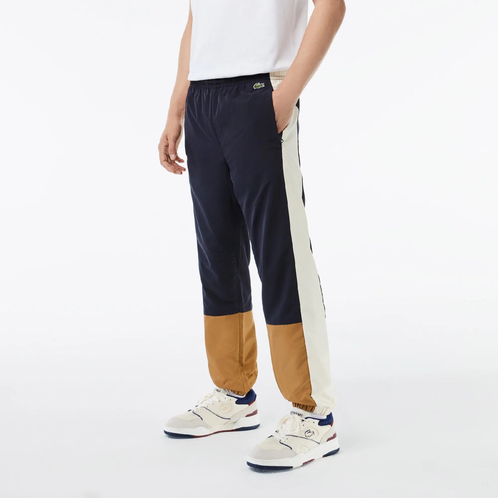 Quần gió Lacoste Chính hãng - Showerproof Colourblock Track Pants - Màu xanh/nâu | JapanSport XH1616-51-RHI