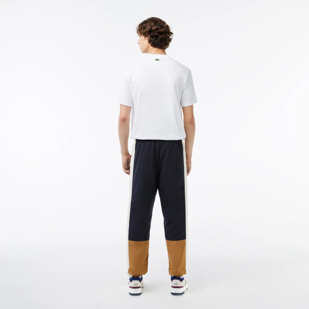 Quần gió Lacoste Chính hãng - Showerproof Colourblock Track Pants - Màu xanh/nâu | JapanSport XH1616-51-RHI