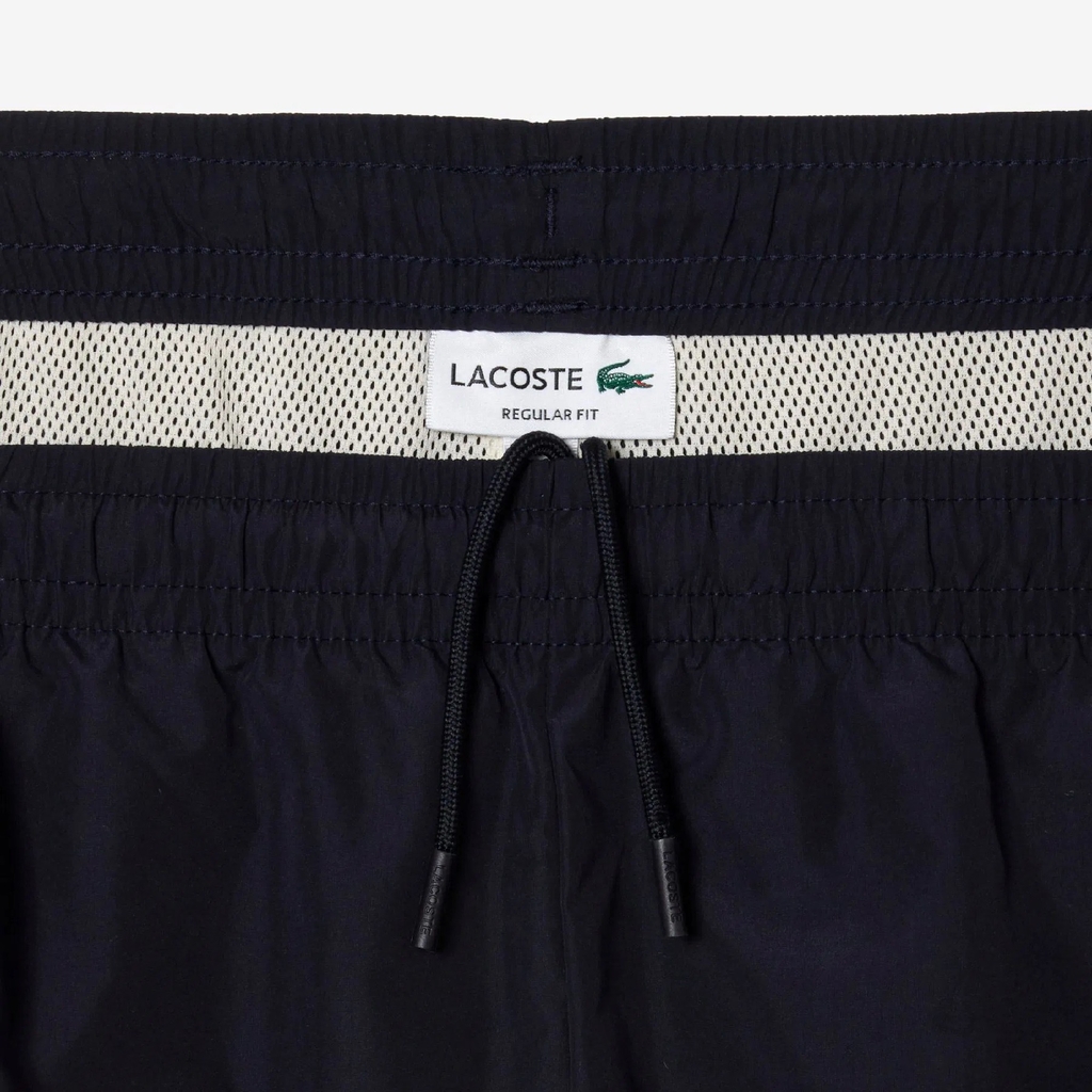 Quần gió Lacoste Chính hãng - Showerproof Colourblock Track Pants - Màu xanh/nâu | JapanSport XH1616-51-RHI