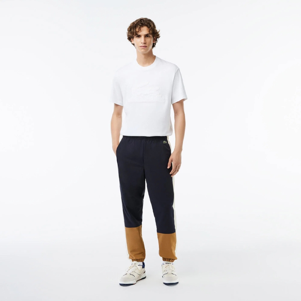 Quần gió Lacoste Chính hãng - Showerproof Colourblock Track Pants - Màu xanh/nâu | JapanSport XH1616-51-RHI